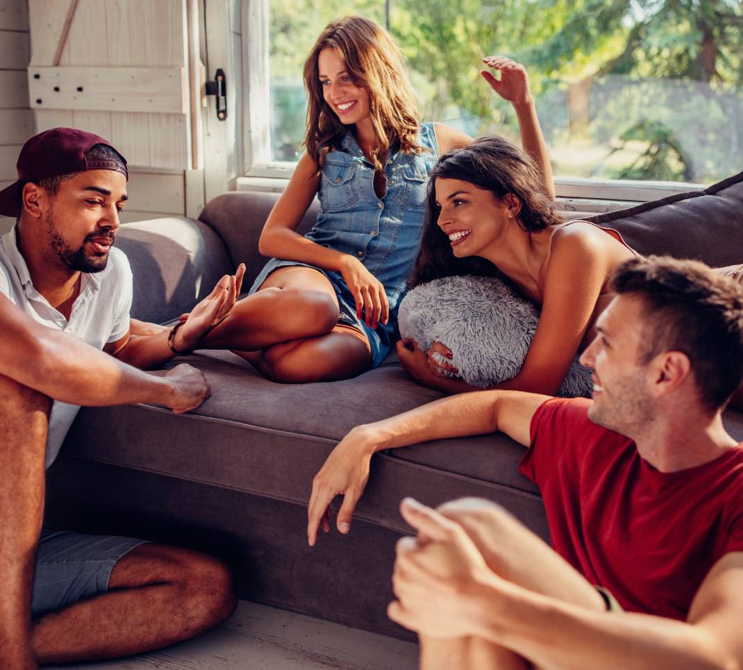 Group of friends relaxing on a couch